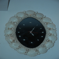 wall clock decorated with sea shells
